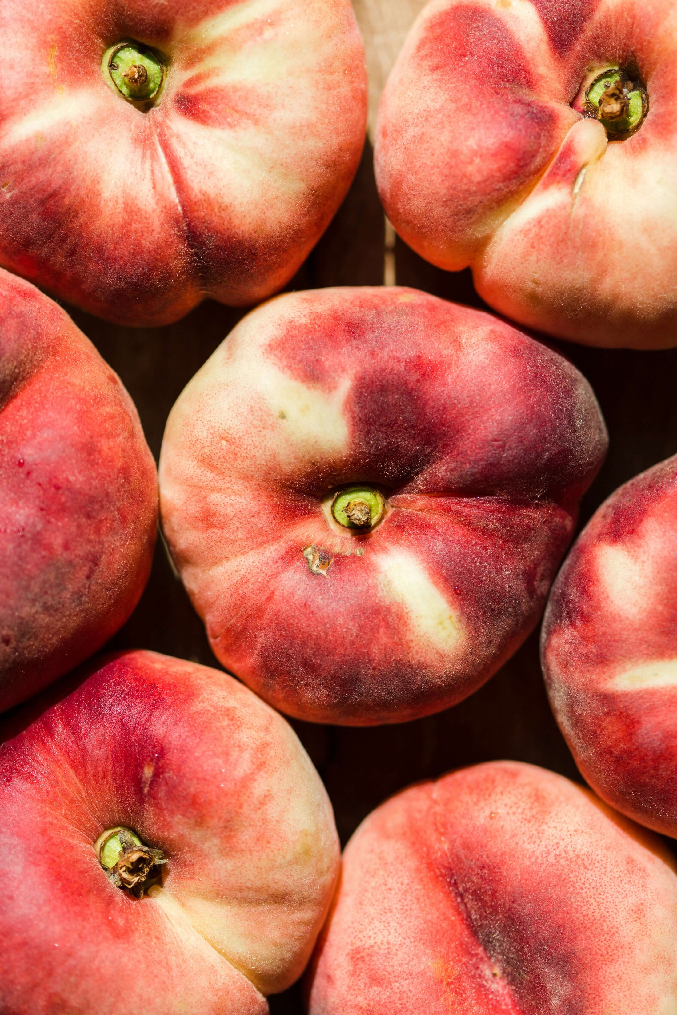 Ripe peaches shot from above.